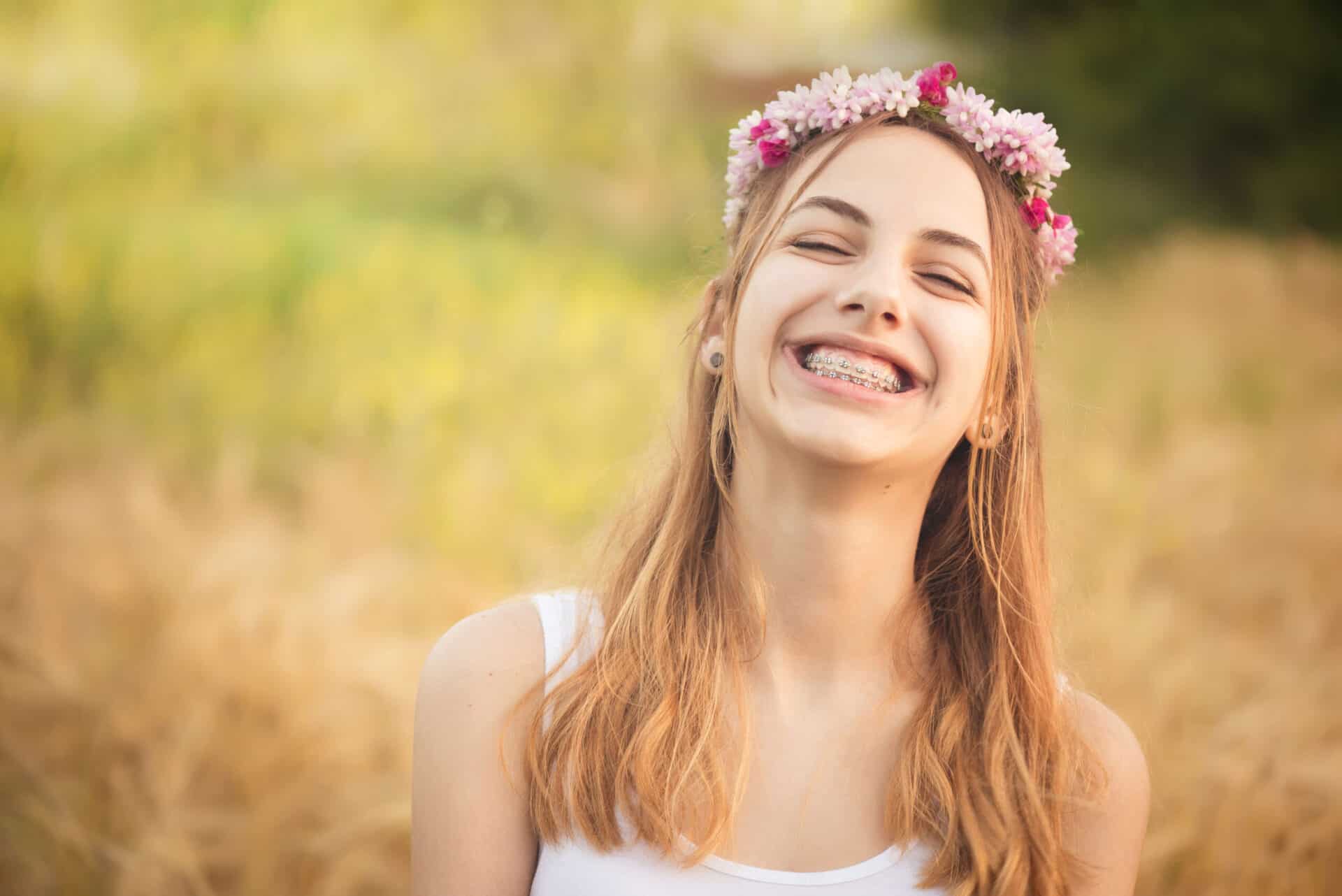 Young teen with braces enjoying the summer